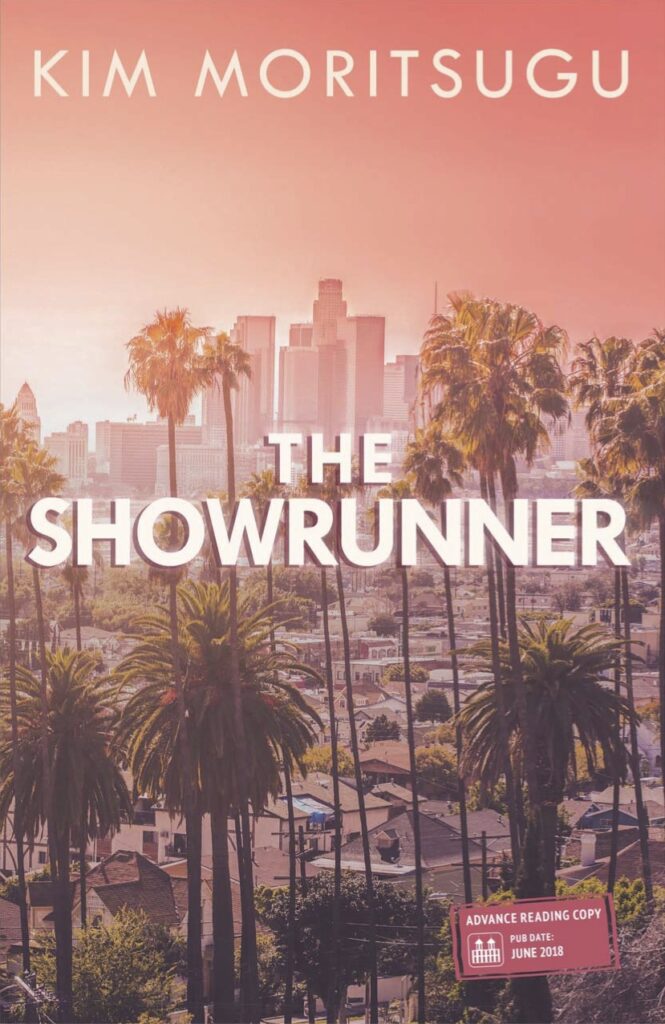 A picture of the los angeles skyline with palm trees.