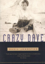 A book cover with a man sitting on the ground.
