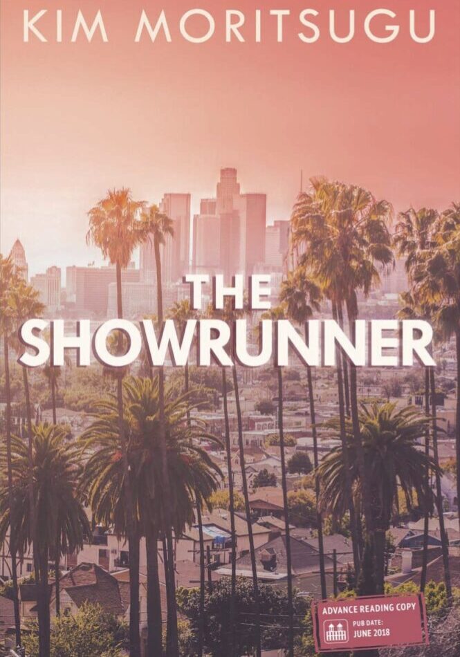 A picture of the los angeles skyline with palm trees.