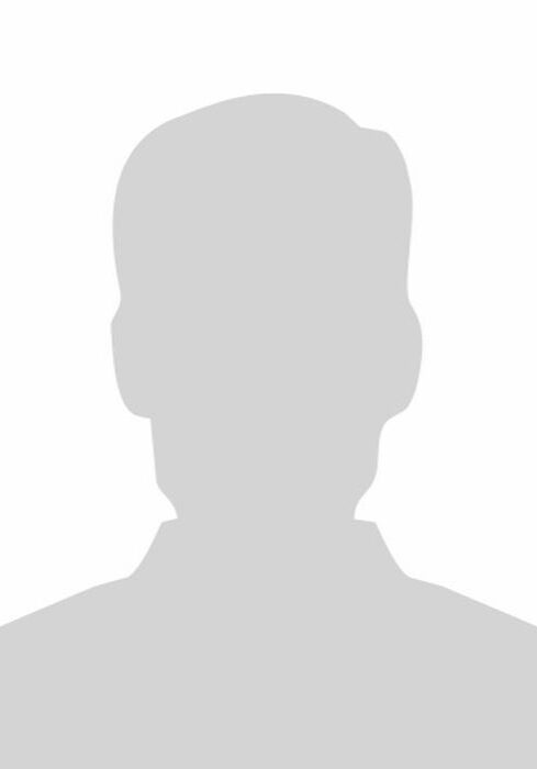 A person 's photo in the shadow of their head.